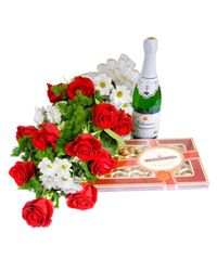 red roses with wine and chocolates